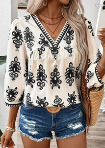 Abstract print W/v neck blouse