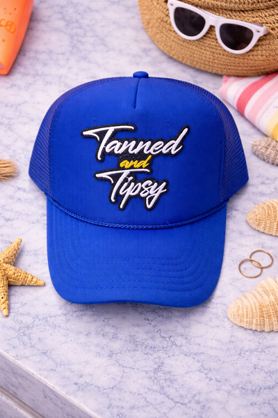Tanned and Tipsy Blue Trucker Hat
 -Otto