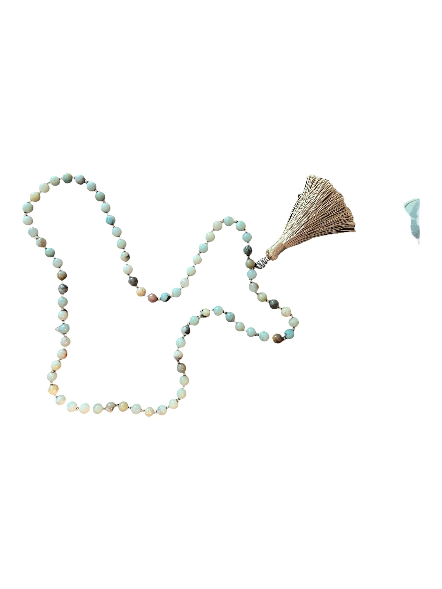 Beaded necklace with chunky stone and tassle
