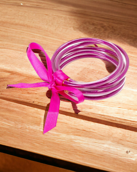 Set of Five Glitter Jelly Vinyl Bracelets With Bow Accent