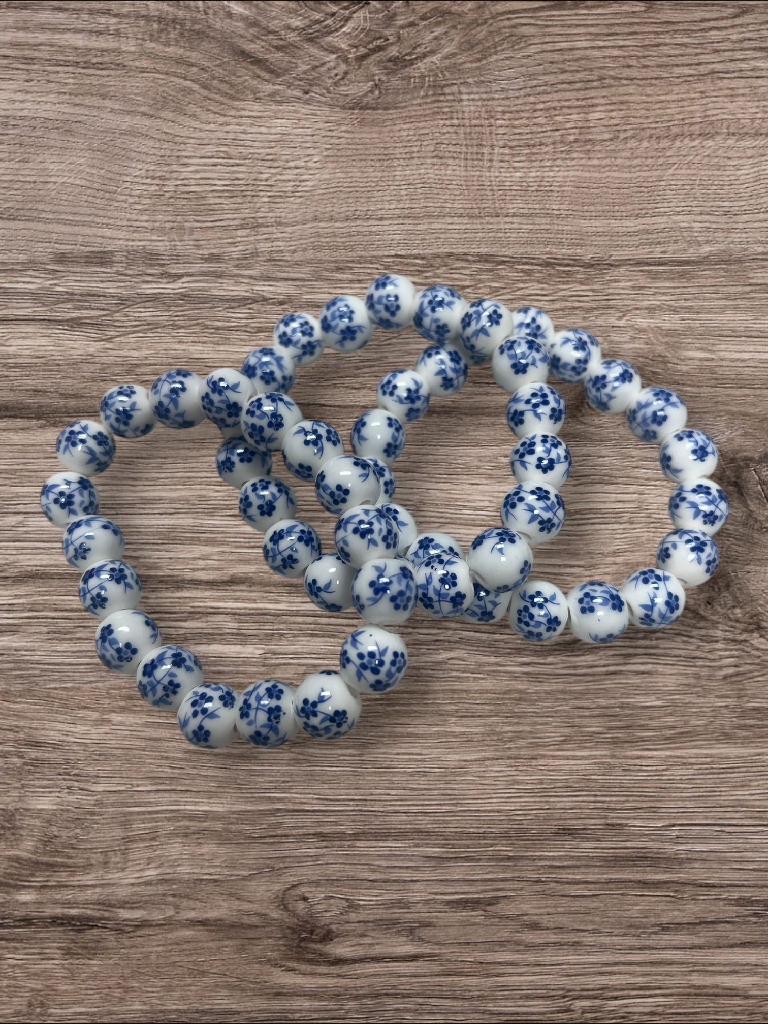 White  w/blue flower porcelin beads   Bracelet