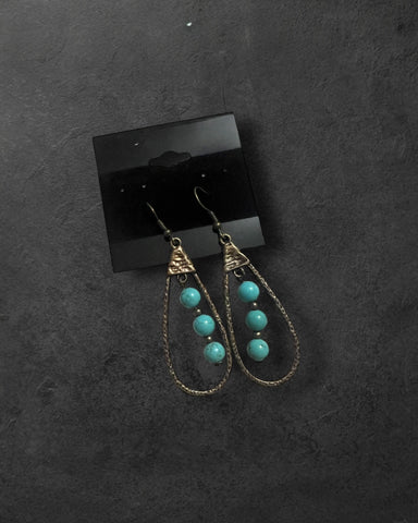 Turquoise beaded pear  drop earrings