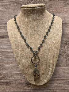 Antique finish w/blue beads and clear pendant