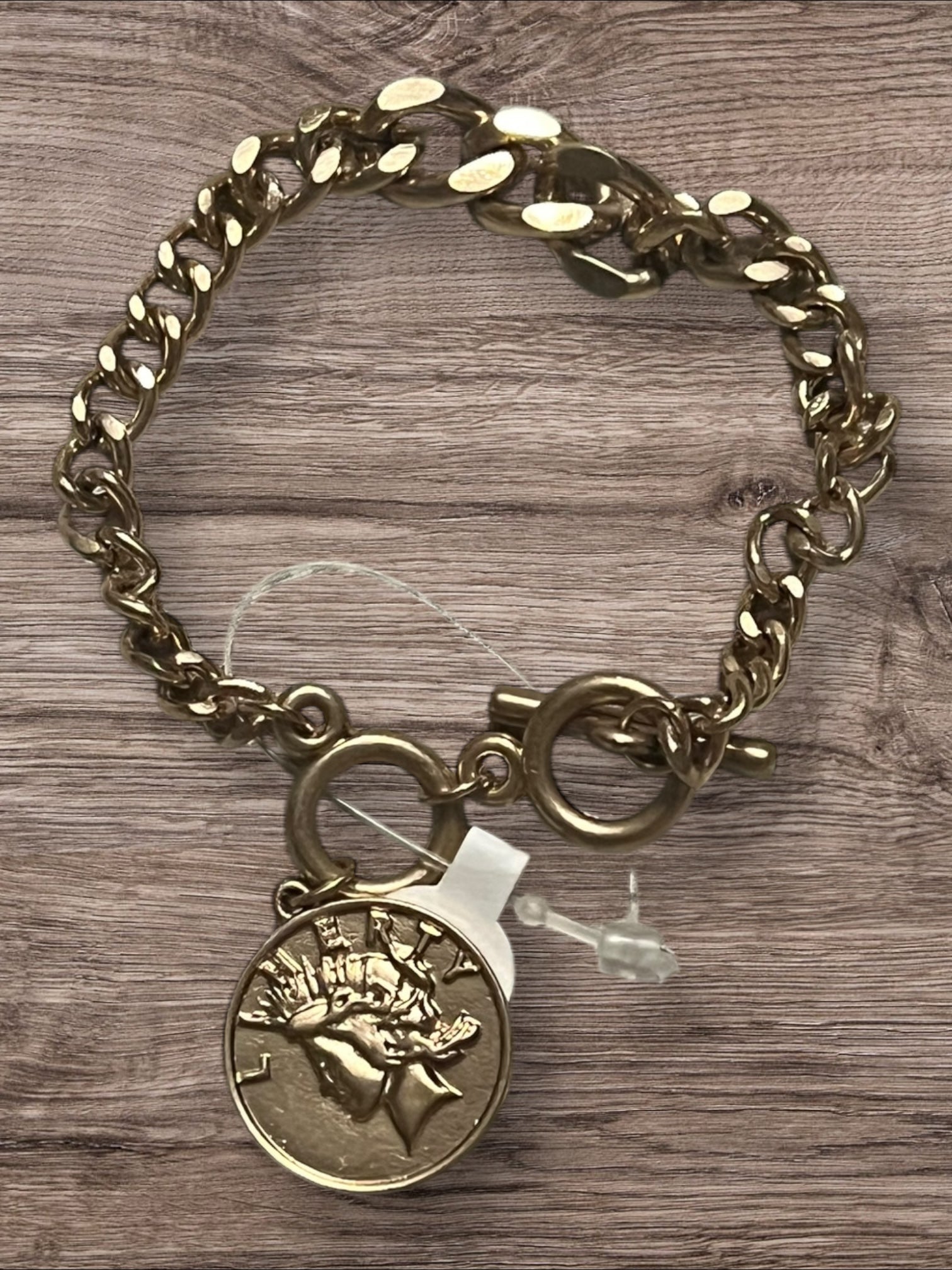 Gold tone coin bracelet