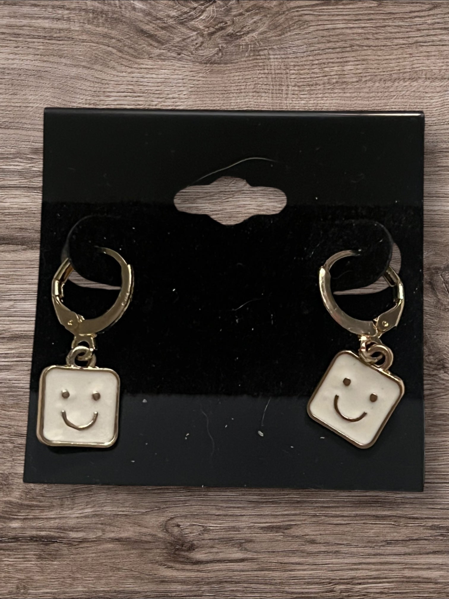 Smiley face hoop earrings